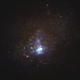 Image of the Kinman Dwarf galaxy, also known as PHL 293B. This tiny galaxy is too far for scientists to pick out individual stars, so what look like stars in this Hubble image are either stars in foreground or gigantic star clusters within the galaxy itself.